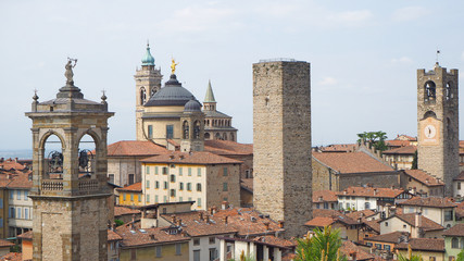 Fototapeta premium Bergamo, Italy. The old town. Landscape at the city center, the old towers and the clock towers from the ancient fortress