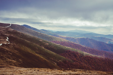Autumn mountains in cloudly day