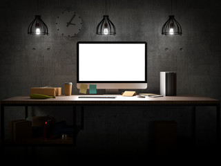 Computer with blank screen with keyboard on desk in office building interior