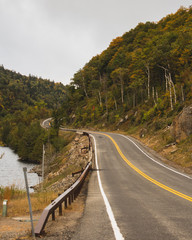 early fall roadscape along lake