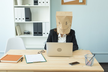 Business, emotions and money concept - office crazy woman put a package with painted funny face on her head. Dollar sign in her eyes