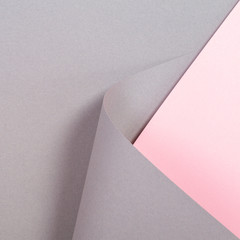 Abstract geometric shape gray and pink color paper background