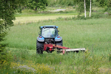 Tractor with hay pasture