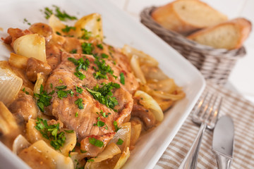 Hunter's steak marinated in a sauce of cream, mushrooms and wine
