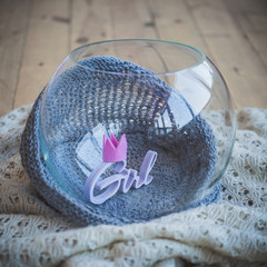 Cute Girl word with pink crown in a glass bowl