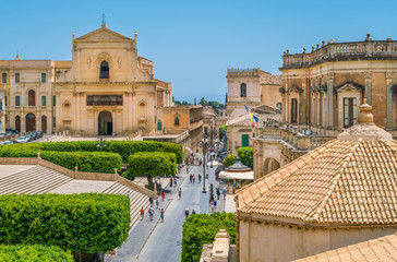 Scenic view in Noto, with the Santissimo Salvatore Church and the Palazzo Ducezio. Province of Siracusa, Sicily, Italy. - obrazy, fototapety, plakaty