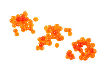 Red caviar on white background, top view.