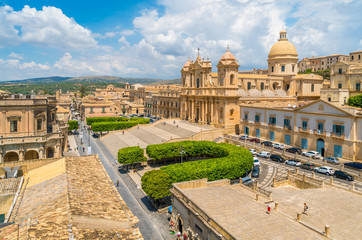 Fototapeta premium Panoramic view in Noto, with the Cathedral and the Palazzo Ducezio. Province of Siracusa, Sicily, Italy.