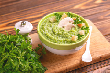 Fresh tasty pureed broccoli soup with vegetables. Healthy food