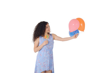 Beautiful Woman with sweet lollipop and baloons.