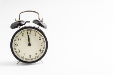Clock isolated on white background with selective focus and crop fragment