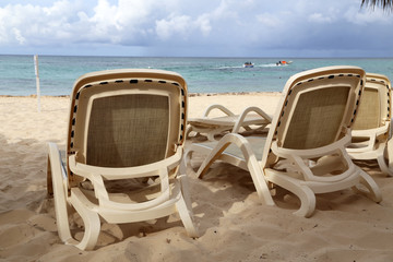 Summer. Beach chairs, chairs on the beach.