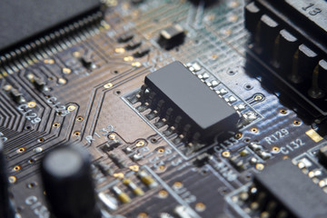 Fototapeta na wymiar Electronic circuit board with chip close up for background