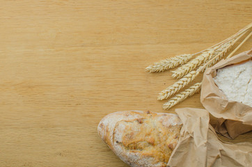 Homemade garlic nut bread on a wooden background
