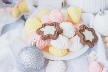 Marshmallow, cookies, meringues and different Christmas decorations