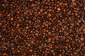 Coffee beans background. Top view. Coffee beans texture.