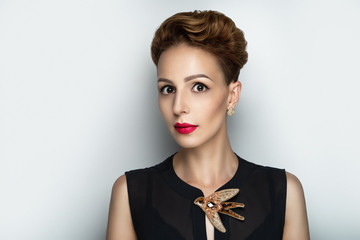 girl with a massive brooch