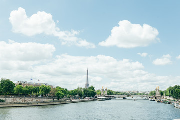 Fototapeta na wymiar PARIS, FRANCE - 02 June 2018 : View of the Eiffel Tower and Siene River in Paris, France.