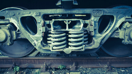 railway tracks with cars close-up. Photo stylized vintage