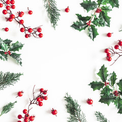 Christmas composition. Frame made of christmas plants on white background. Flat lay, top view, copy...