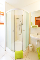 Shower cabin inside of bathroom interior.