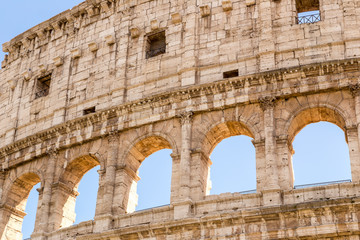 Obraz premium Colosseum with clear blue sky, Rome, Italy Rome landmark and antique architecture