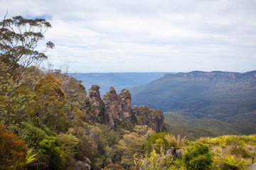 The Three Sisters Cliffs in Blue Mountains National Park, NSW, Australia, view from Echo Point. Their names are Meehni (922 m), Wimlah (918 m), and Gunnedoo (906 m)