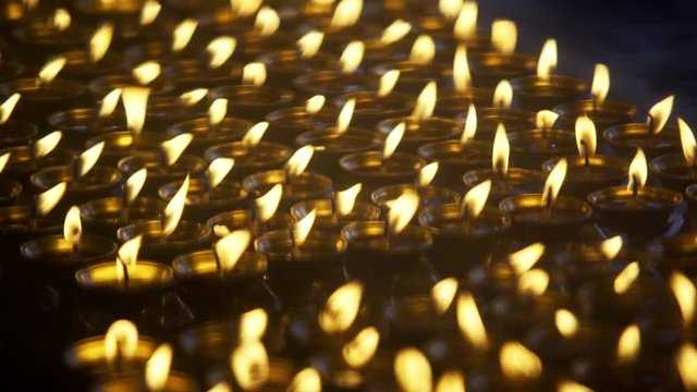 Candles burning in the Dalai Lama temple. Macleod Ganj, Dharamsala, India