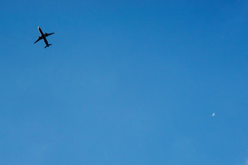 The plane flies in the clouds