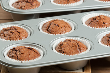 Homebaked Muffins With Chocolate, Banana, Coconut In Baking Tray.