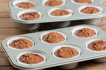Homebaked Muffins With Chocolate, Banana, Coconut In Baking Tray.