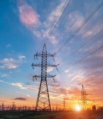 High-voltage power lines. Electricity distribution station. high voltage electric transmission tower. Distribution electric substation with power lines and transformers © yelantsevv