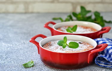 Homemade vanilla casserole with ricotta and raisins. Vanilla pudding.