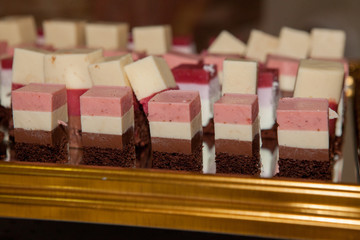 Chocolate and raspberry cake, mousse dessert on a white plate