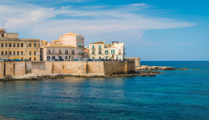 Fototapeta na wymiar Siracusa waterfront in Ortigia on a sunny summer day. Sicily, southern Italy.