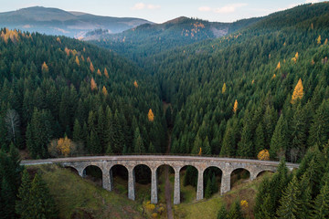 Chmarossky viaduct goes through pine forest near village Telgart, Slovakia