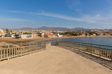 View from Cabezo de Gavilan mirador to Playa de la Reya beach and bay Puerto de Mazarron Spain 
