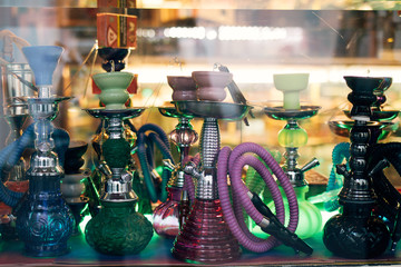 Amsterdam drug tourism - waterpipes or shisha store with colorful pipes