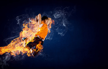Fototapeta na wymiar Basketball Player on Fire