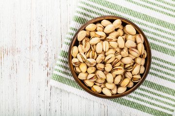 Sea Salt Roasted Pistachios Background. Selective focus.