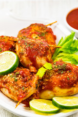 Stuffed Calamari Squid Tubes with Tomato Sauce. Selective focus.