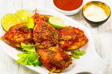 Stuffed Calamari Squid Tubes with Tomato Sauce. Selective focus.