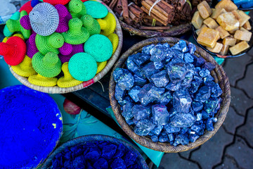 Bowls of spices, minerals and crafts in the medina of Essaouira, on Morocco's Atlantic coast