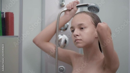 Smiling Young Girl Bathing Under A Shower At Home Beautiful Teen Girl