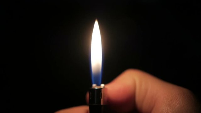 Flame lighter on a black background.