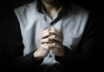 Praying Hands In Dark