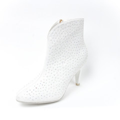 Women's wedding shoe on white background