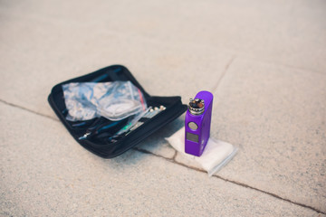 Maintenance of electronic mech mod vaping device.Modern vaporizer e-cig gadget to vape glycerin...