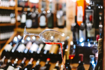 Glass of Wine Falling Mid Air with Spill