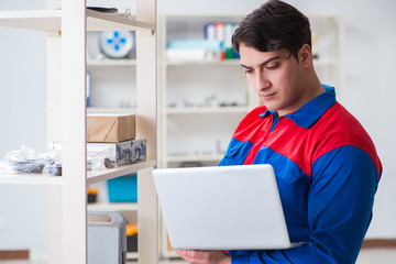 Man working in the postal warehouse